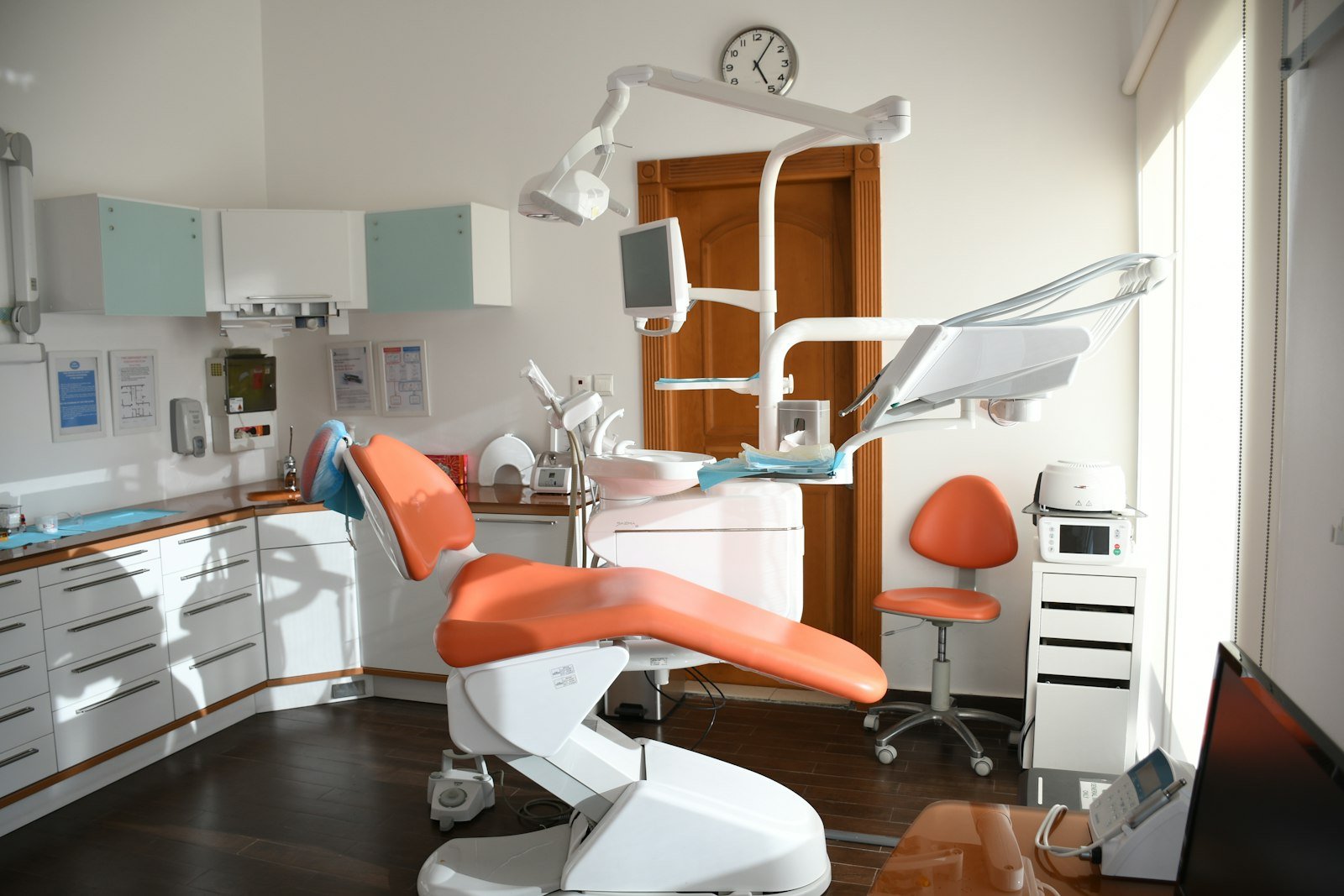 A modern dental treatment chair set up for a procedure