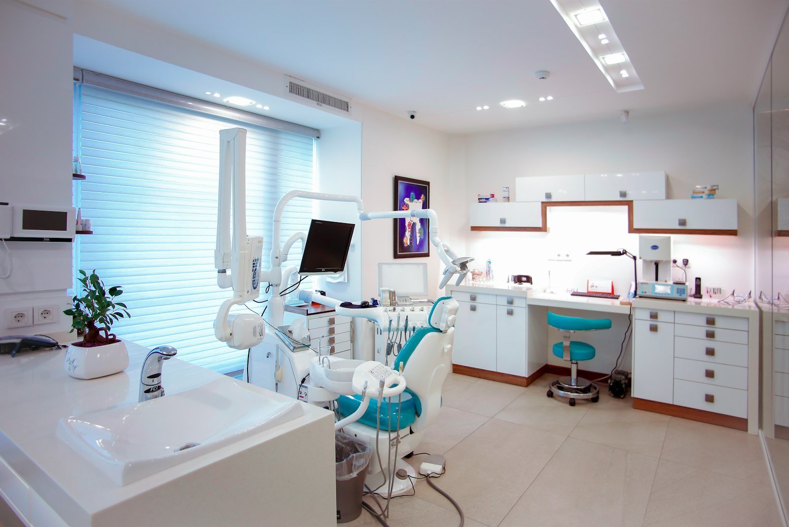 A bright, modern treatment room at H+ Dental Clinic